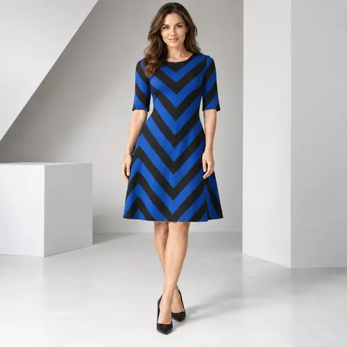 Royal blue and black chevron print dress Royal blue and black chevron-stripe fit-and-flare knee-length dress with elbow sleeves, geometric studio backdrop